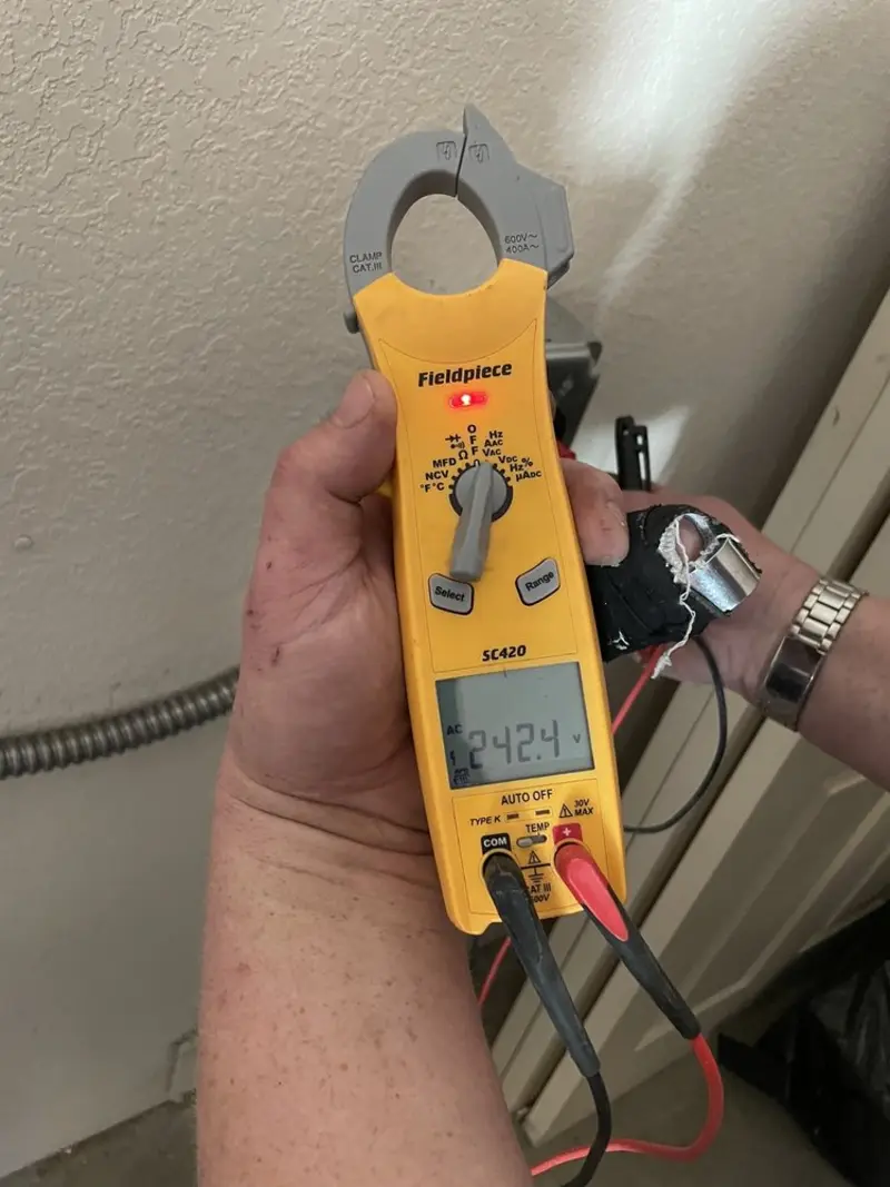 Voltage testing with clamp meter during Electrical Installation Services in Hidden Meadows